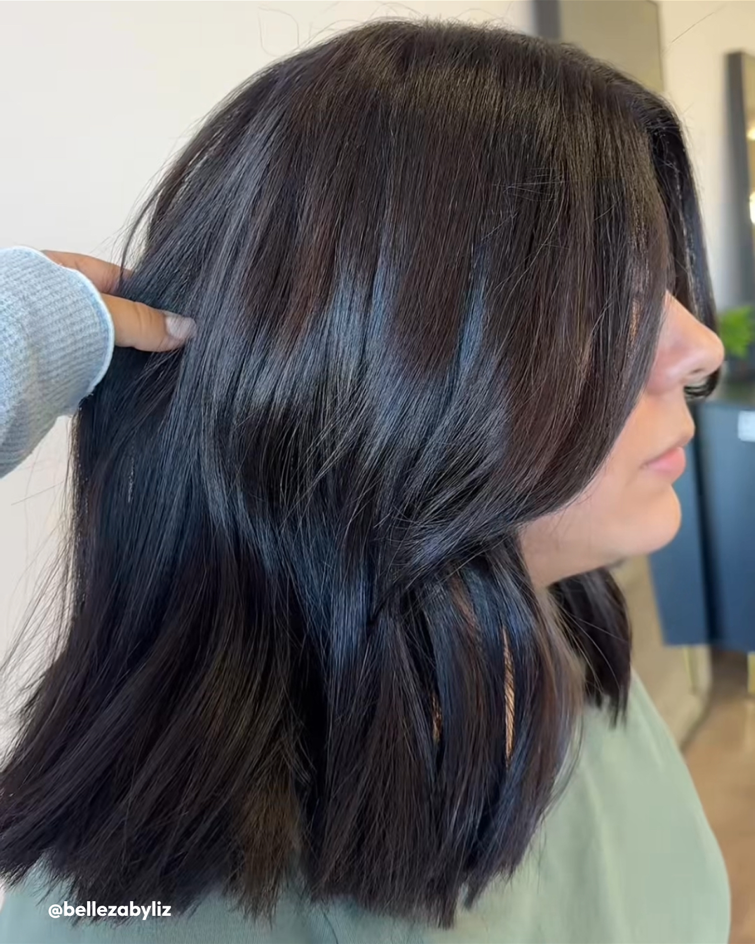 Women with Silk Reconstructor, Shine Cream, and Polish in hair