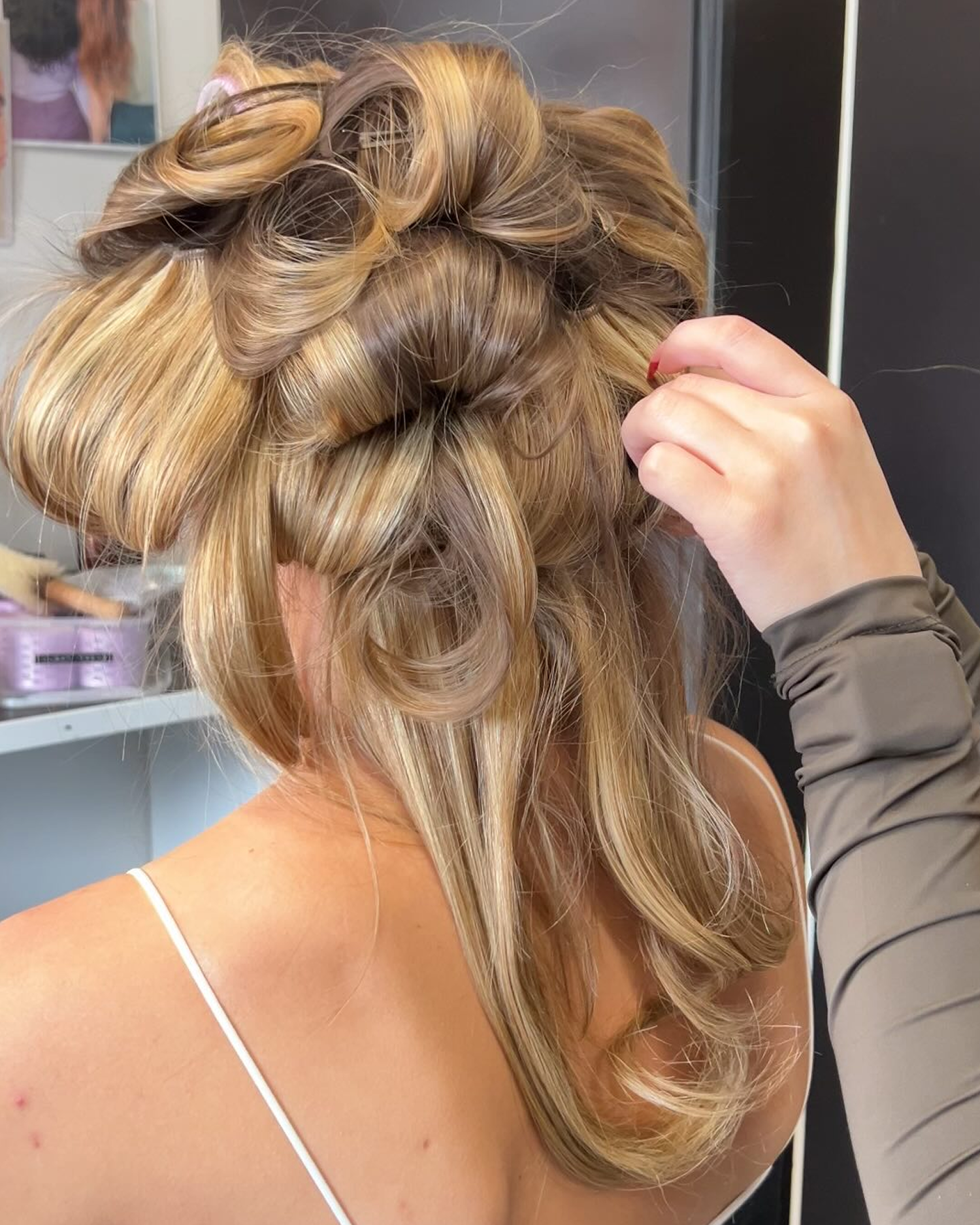 Woman wearing Styling Foam in hair