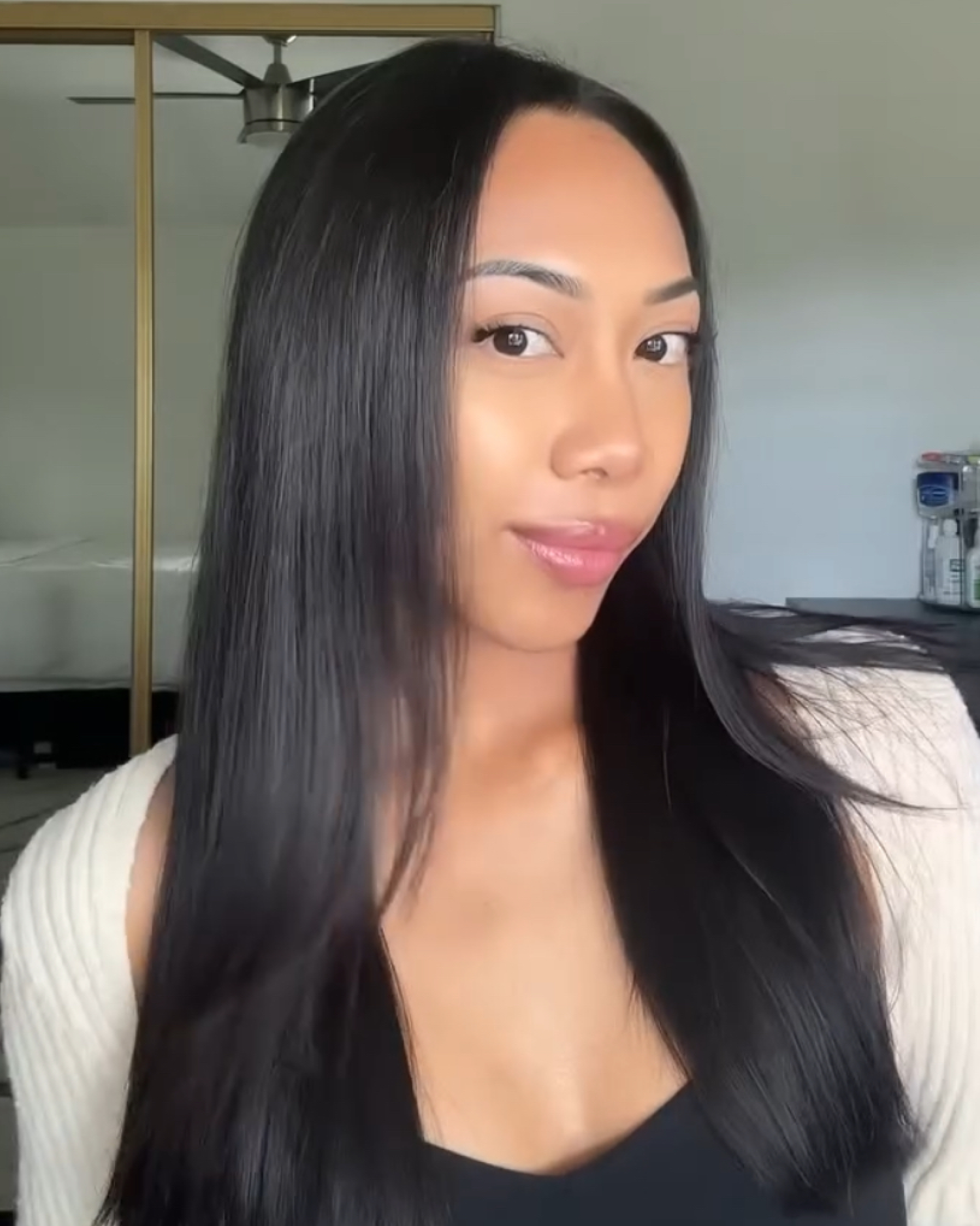 Woman with Favorite Shampoo and Conditioner in hair