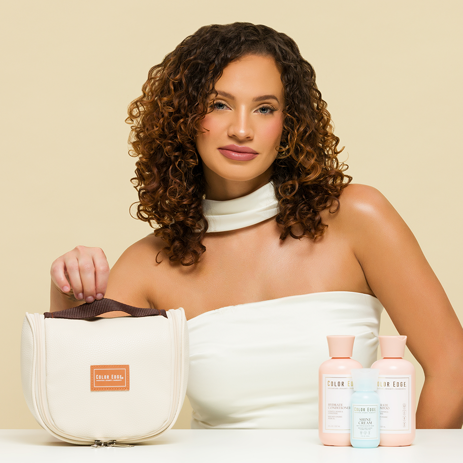 Woman holding All Essentials Hair Bag