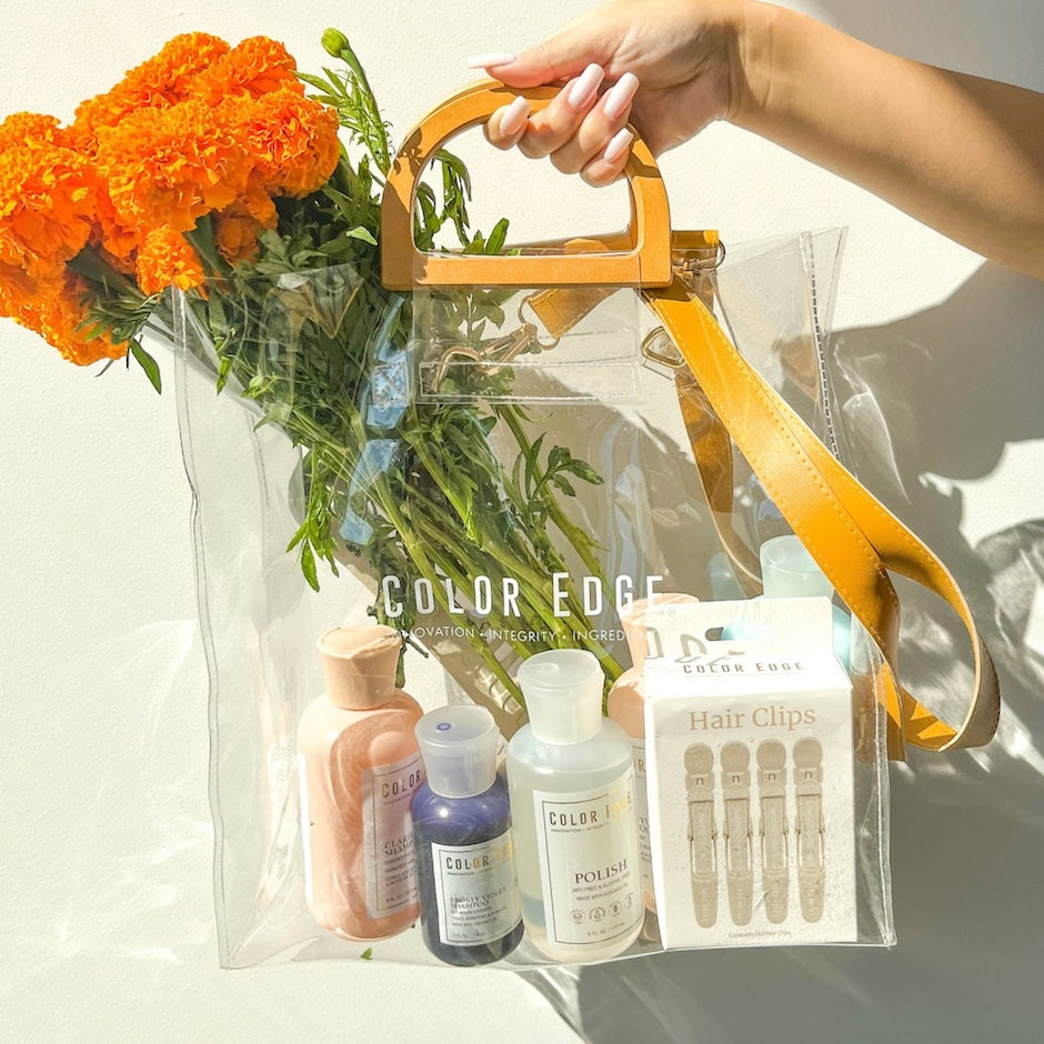 Clear Tote Bag carrying flowers and Color Edge products