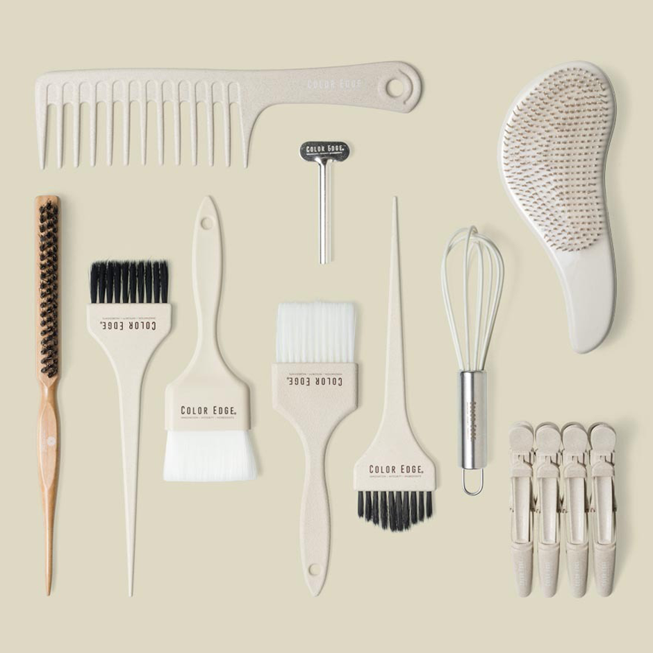 Various hair coloring tools and brushes laid out