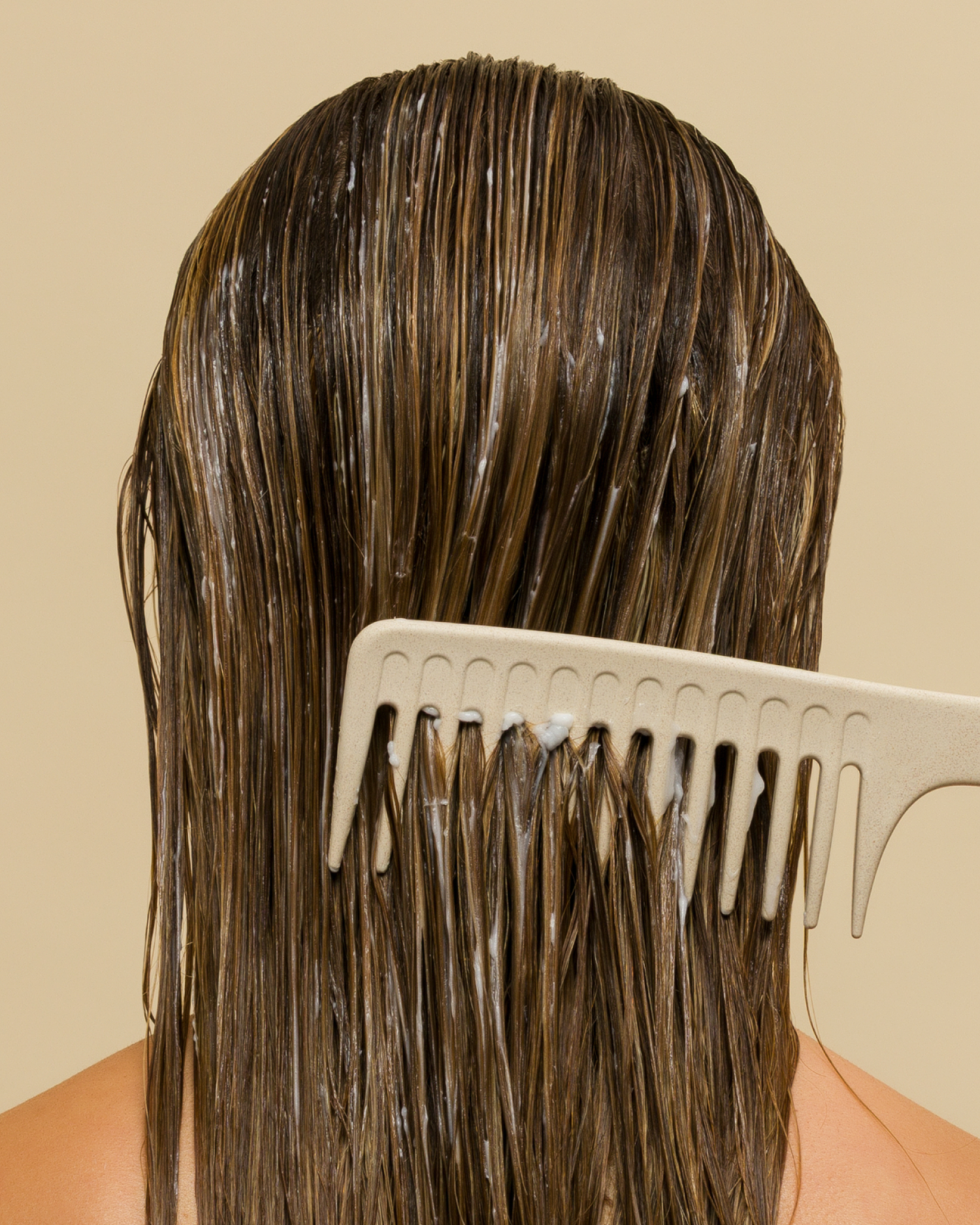 Wet hair with hair mask applied