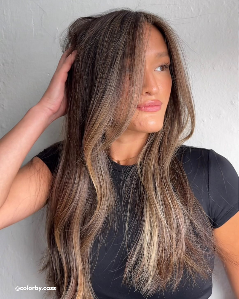 Woman wearing Shine Cream in hair 