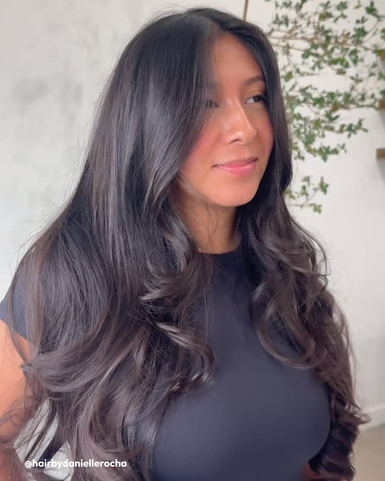 Woman wearing Shine Cream and Camellia Oil in hair 