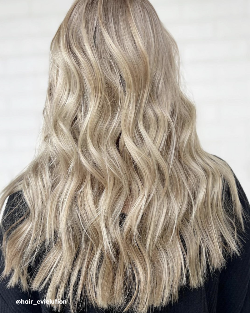 Woman wearing Shine Cream, Polish, and Tapestry in hair 