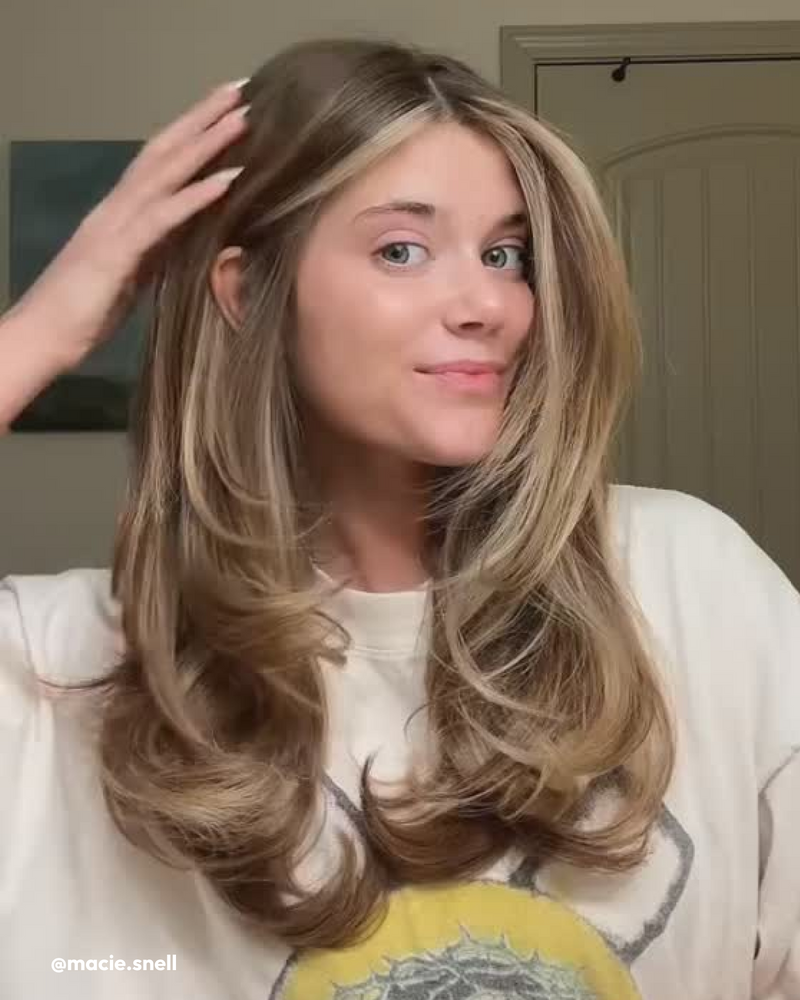 Woman wearing Styling Foam in hair 
