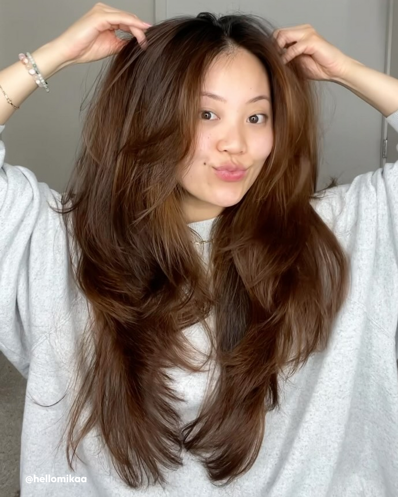 Woman wearing Styling Foam in hair 